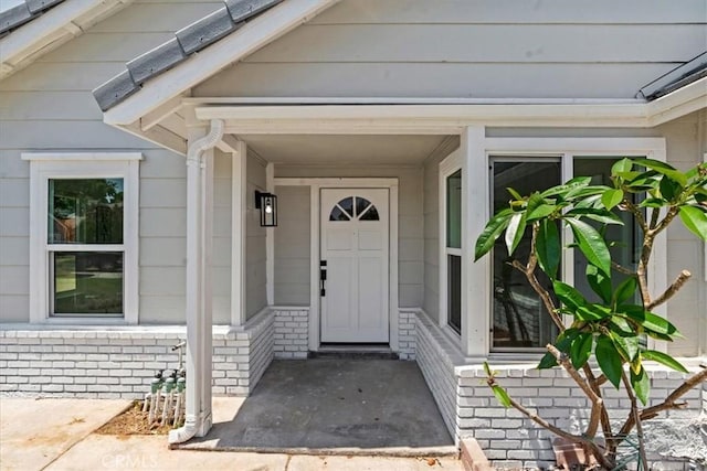 3176 Landmark Ct, Riverside, CA 92503 - property entrance featuring a porch and brick siding