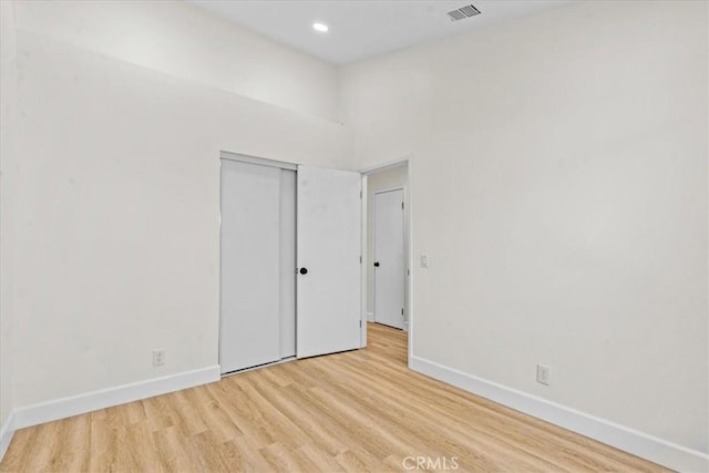 3176 Landmark Ct, Riverside, CA 92503 - spare room with wood finished floors and recessed lighting