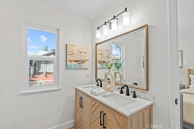 3176 Landmark Ct, Riverside, CA 92503 - bathroom with double vanity and plenty of natural light