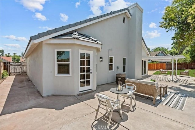 3176 Landmark Ct, Riverside, CA 92503 - rear view of property with a patio, stucco siding, and a fenced backyard