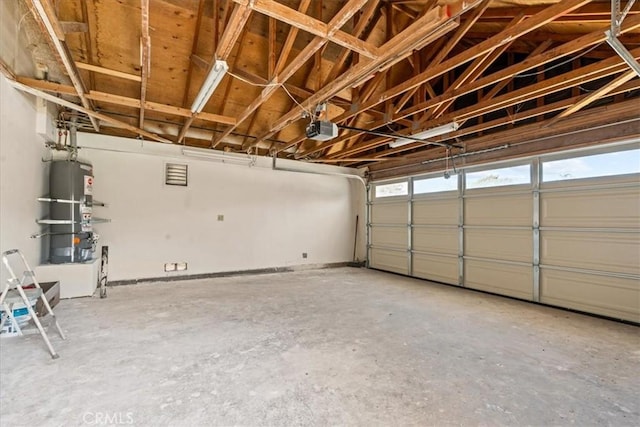 3176 Landmark Ct, Riverside, CA 92503 - garage with water heater and a garage door opener