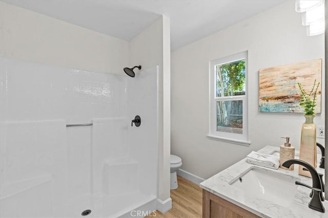 3176 Landmark Ct, Riverside, CA 92503 - full bath featuring a shower, vanity, and wood finished floors