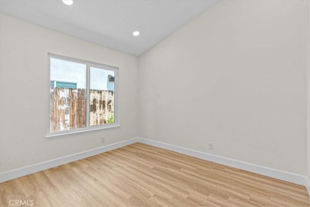 3176 Landmark Ct, Riverside, CA 92503 - spare room featuring light wood-style floors, lofted ceiling, and recessed lighting