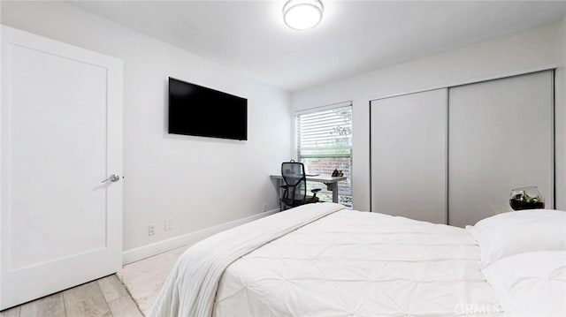 4632 Park Granada Unit 93, Calabasas, CA 91302 - bedroom with wood finished floors, baseboards, and a closet