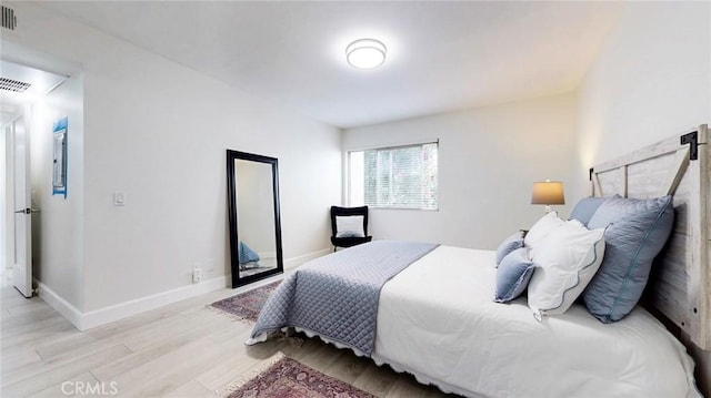 4632 Park Granada Unit 93, Calabasas, CA 91302 - bedroom with light wood-type flooring and baseboards