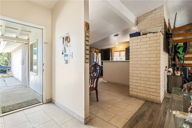 1126 W W Ave H6, Lancaster, CA 93534 - entryway featuring beam ceiling and light tile patterned floors