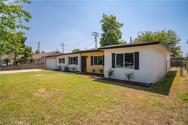 1151 Grand Ave, Colton, CA 92324 - ranch-style house with a garage, concrete driveway, and stucco siding