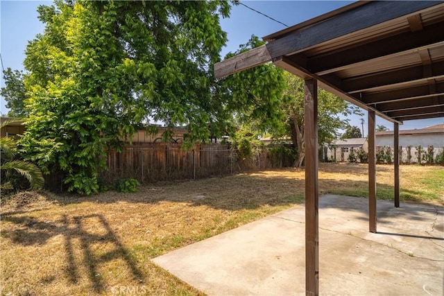 1151 Grand Ave, Colton, CA 92324 - fenced backyard featuring a patio area