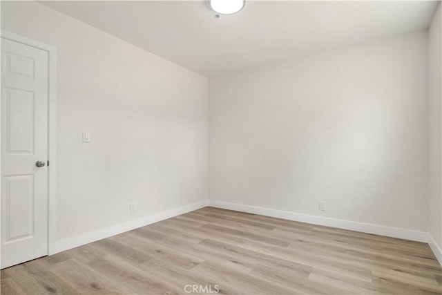 1151 Grand Ave, Colton, CA 92324 - empty room with light wood finished floors and baseboards