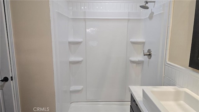 42269 Whittier Ave, Hemet, CA 92544 - bathroom with vanity, a shower, and a wainscoted wall