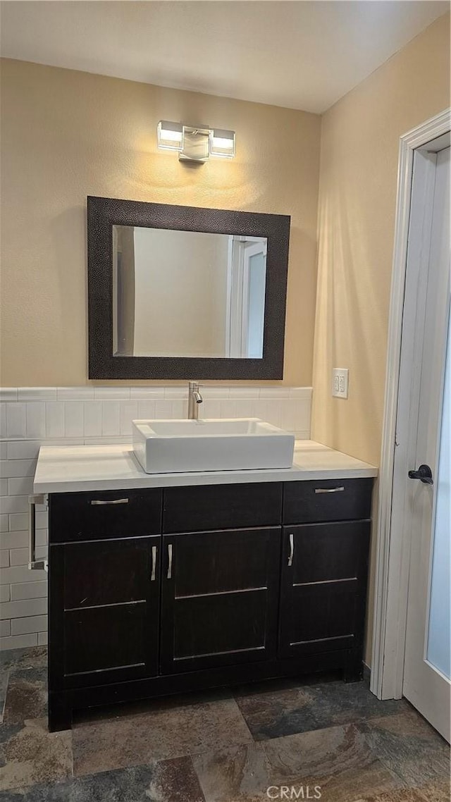 42269 Whittier Ave, Hemet, CA 92544 - bathroom featuring vanity and stone finish flooring