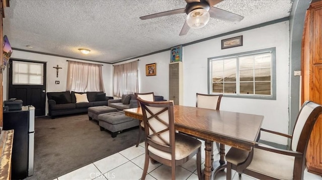 3510 E 2nd St, Los Angeles, CA 90063 - dining room featuring light colored carpet, a ceiling fan, light tile patterned floors, and a textured ceiling