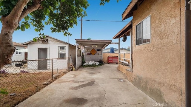 3510 E 2nd St, Los Angeles, CA 90063 - view of side of property featuring stucco siding and a patio area