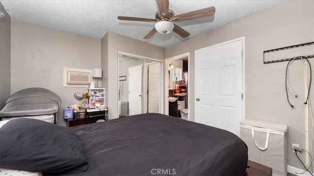 3510 E 2nd St, Los Angeles, CA 90063 - bedroom with a textured ceiling, connected bathroom, and ceiling fan
