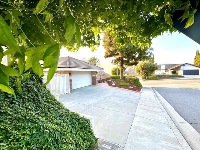 1601 Calle De Armonia, San Dimas, CA 91773 - view of side of property featuring concrete driveway and a tiled roof