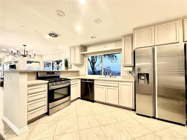 1601 Calle De Armonia, San Dimas, CA 91773 - kitchen featuring appliances with stainless steel finishes, a peninsula, light countertops, a chandelier, and recessed lighting
