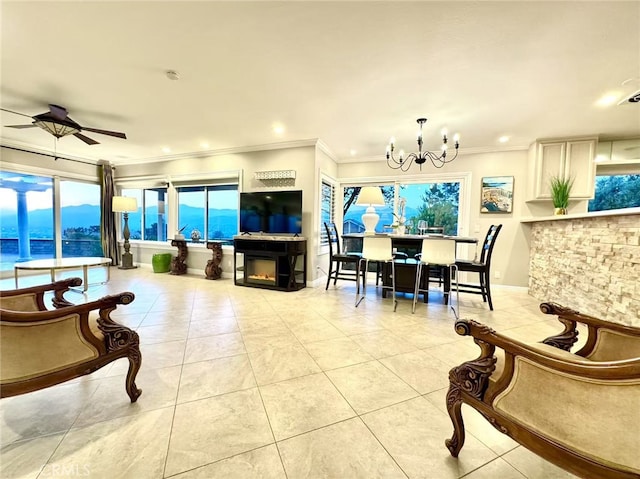1601 Calle De Armonia, San Dimas, CA 91773 - living area featuring light tile patterned floors, a chandelier, ornamental molding, ceiling fan, and plenty of natural light