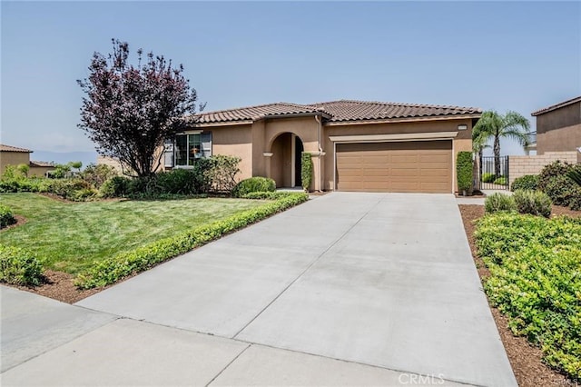 16550 Village Meadow Dr, Riverside, CA 92503 - mediterranean / spanish house featuring a garage, stucco siding, driveway, and a tiled roof