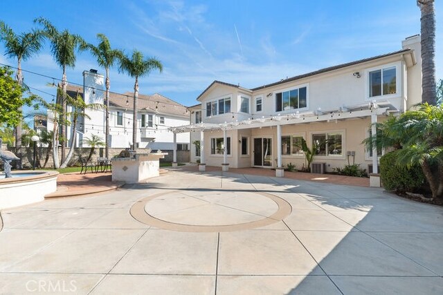 3264 Silver Maple Dr, Yorba Linda, CA 92886 - back of house featuring a pergola, a patio area, and stucco siding
