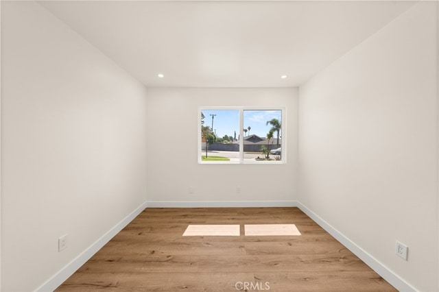 6880 Topaz St, Rancho Cucamonga, CA 91701 - spare room featuring wood finished floors and recessed lighting