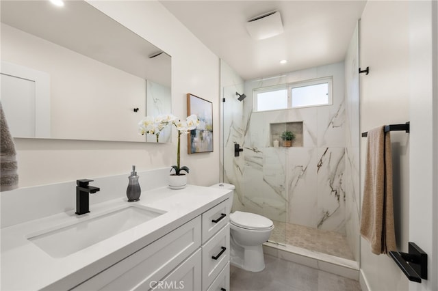 6880 Topaz St, Rancho Cucamonga, CA 91701 - bathroom featuring vanity, a marble finish shower, recessed lighting, and tile patterned floors