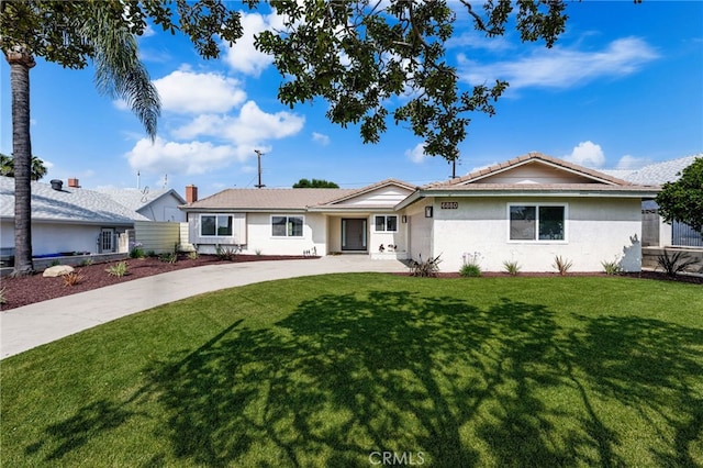 6880 Topaz St, Rancho Cucamonga, CA 91701 - ranch-style house with a front yard and stucco siding