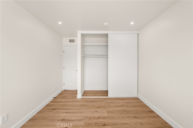 6880 Topaz St, Rancho Cucamonga, CA 91701 - unfurnished bedroom with a closet, light wood-type flooring, and recessed lighting