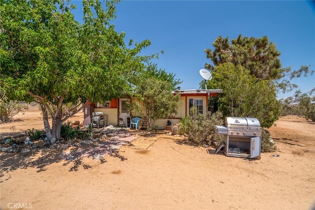 1676 Avalon Ave, Yucca Valley, CA 92284 - view of property hidden behind natural elements
