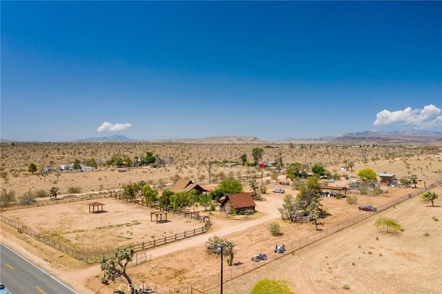 1676 Avalon Ave, Yucca Valley, CA 92284 - aerial view of sparsely populated area featuring a desert landscape and a mountainous background