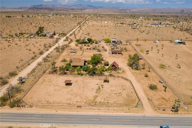 1676 Avalon Ave, Yucca Valley, CA 92284 - view of rural area with a desert landscape and a mountain backdrop