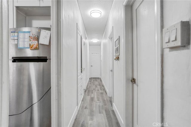 1732 W 48th St, Los Angeles, CA 90062 - corridor with light wood-style flooring and baseboards