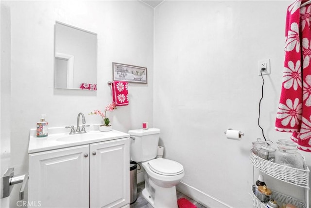 1732 W 48th St, Los Angeles, CA 90062 - bathroom featuring toilet, vanity, and baseboards