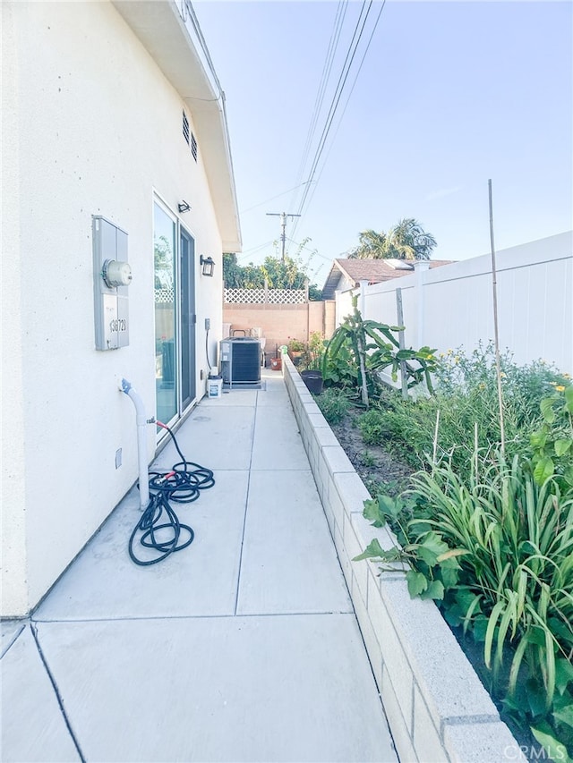 13672 Monroe St, Westminster, CA 92683 - fenced backyard with a patio area and central air condition unit