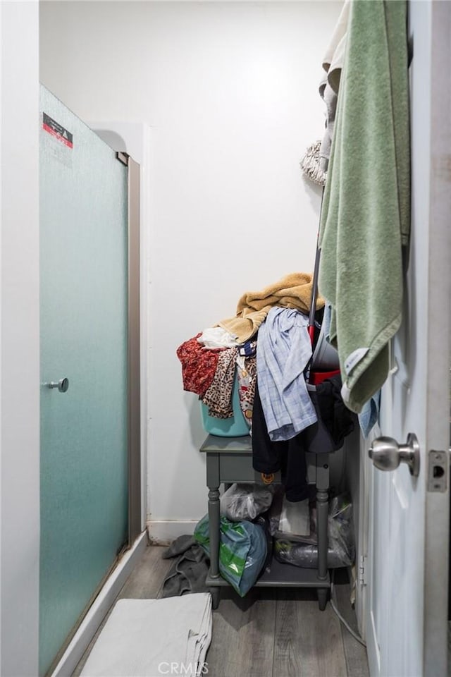 13672 Monroe St, Westminster, CA 92683 - full bathroom featuring a shower stall and wood finished floors