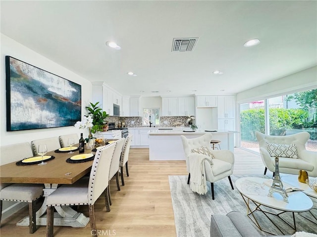 32942 Paseo Del Lucero, San Juan Capistrano, CA 92675 - dining space with light wood-style floors and recessed lighting