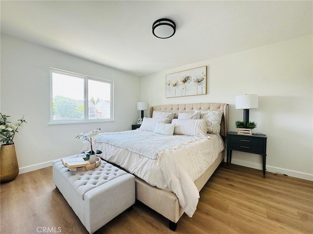 32942 Paseo Del Lucero, San Juan Capistrano, CA 92675 - bedroom featuring wood finished floors and baseboards