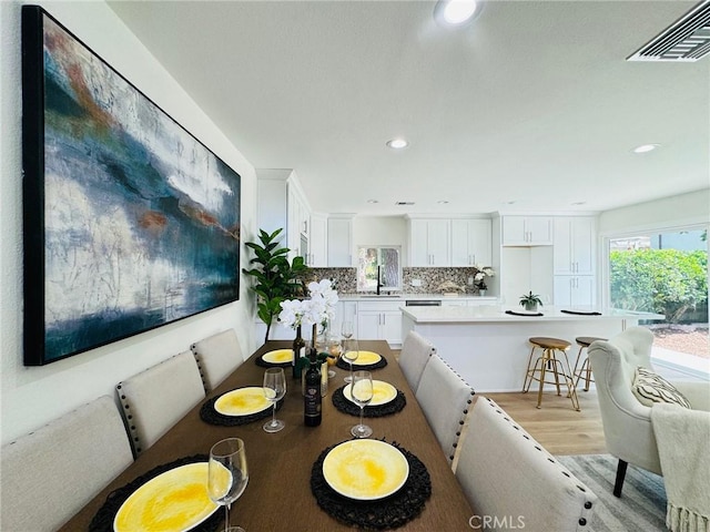 32942 Paseo Del Lucero, San Juan Capistrano, CA 92675 - dining room with light wood-style floors and recessed lighting