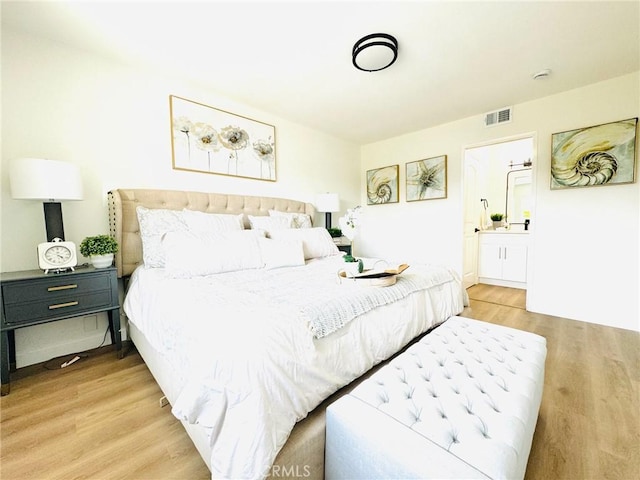 32942 Paseo Del Lucero, San Juan Capistrano, CA 92675 - bedroom featuring wood finished floors and ensuite bath