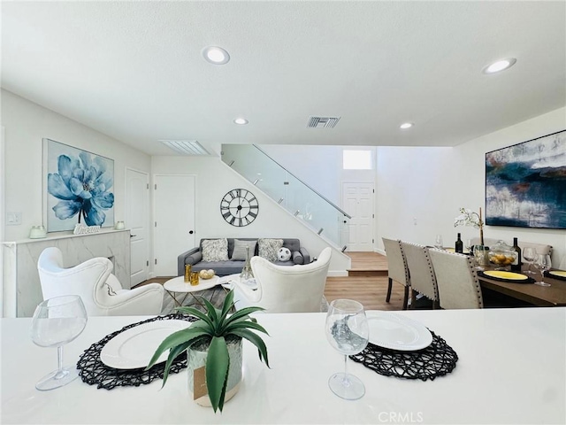 32942 Paseo Del Lucero, San Juan Capistrano, CA 92675 - living area featuring stairs, recessed lighting, and wood finished floors