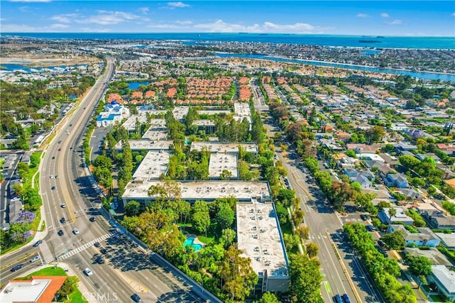 564 N Bellflower Blvd Unit 120, Long Beach, CA 90814 - aerial view of property and surrounding area featuring a major roadway, a nearby body of water, and nearby suburban area
