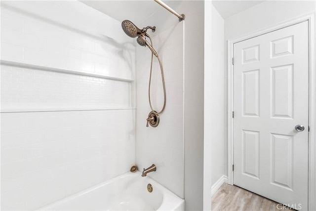 564 N Bellflower Blvd Unit 120, Long Beach, CA 90814 - full bath featuring tub / shower combination and wood finished floors