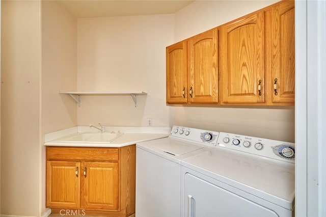 1558 Rockrose Way, Beaumont, CA 92223 - laundry area with cabinet space and washer and dryer