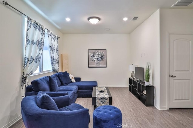 6886 Cache Way, Jurupa Valley, CA 91752 - living area featuring wood finished floors and recessed lighting