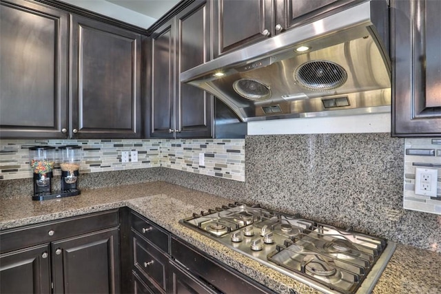 6886 Cache Way, Jurupa Valley, CA 91752 - kitchen with extractor fan, stainless steel gas cooktop, and dark brown cabinets