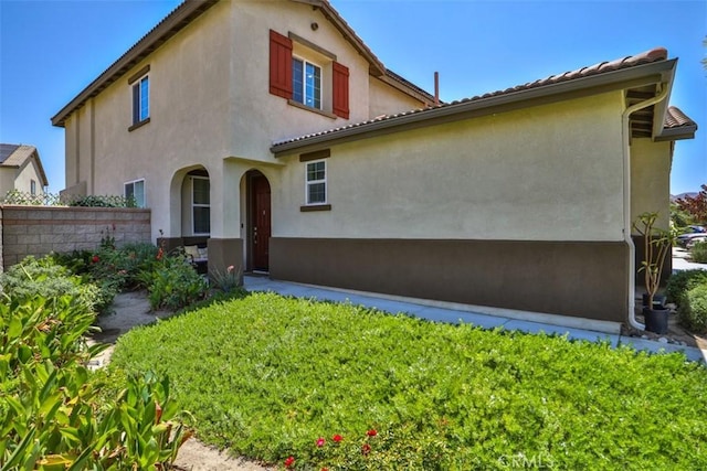 6886 Cache Way, Jurupa Valley, CA 91752 - rear view of house featuring stucco siding