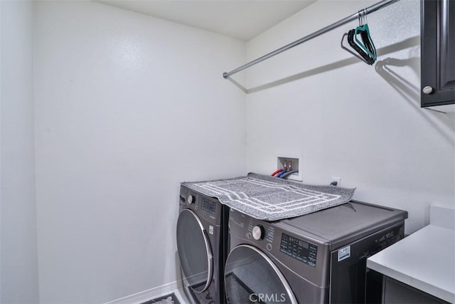 6886 Cache Way, Jurupa Valley, CA 91752 - laundry area with washing machine and clothes dryer and cabinet space