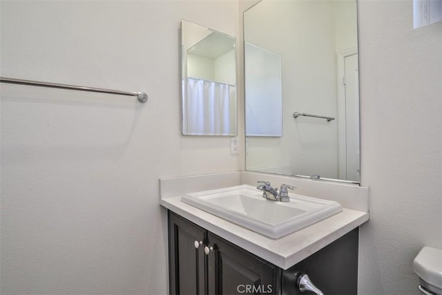 6886 Cache Way, Jurupa Valley, CA 91752 - bathroom featuring vanity and toilet
