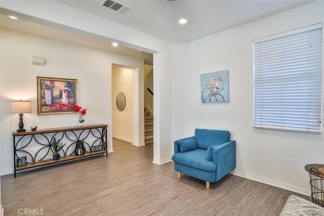 6886 Cache Way, Jurupa Valley, CA 91752 - sitting room featuring wood finished floors, stairway, and recessed lighting