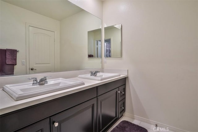 6886 Cache Way, Jurupa Valley, CA 91752 - bathroom with double vanity and tile patterned floors