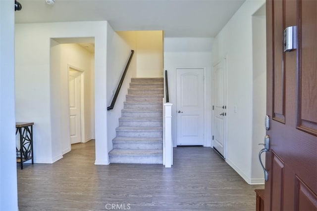 6886 Cache Way, Jurupa Valley, CA 91752 - foyer entrance featuring dark wood-type flooring and stairway